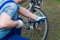 Man pumping wheel bike