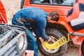 A man pumps air wheel with a compressor Royalty Free Stock Photo