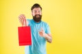 Man with purchase. Impulse purchase. Purchase concept. Male motives for shopping appear to be more utilitarian. Aspects Royalty Free Stock Photo
