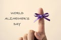 Purple ribbon and text world alzheimers day