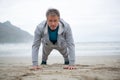 Man push-up on beach