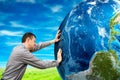Man pushes the planet. Royalty Free Stock Photo