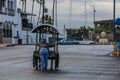 Man pushing a cart. Ensenada strrets, city of Baja California Mexico