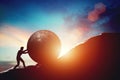 Man pushing huge concrete ball up hill Royalty Free Stock Photo