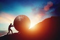 Man pushing huge concrete ball up hill