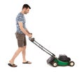 Man pushing old green lawn mower Royalty Free Stock Photo