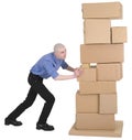 Man pushing pile cardboard boxes