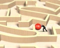 Man pushing red ball in wooden maze game