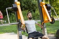 Man pushing the training apparatus on the open air gym Royalty Free Stock Photo