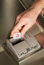 Man puting a tablet in the dishwashing machine Royalty Free Stock Photo