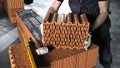 Man puts a brick on a brick wall. Stock footage. Worker on a construction site. Concept of construction Royalty Free Stock Photo