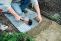 Man puts paving Royalty Free Stock Photo