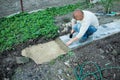 Man puts paving Royalty Free Stock Photo