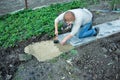 Man puts paving Royalty Free Stock Photo