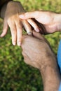 Man Puts a Ring o Woman's Finger-Close up-Vertical Royalty Free Stock Photo