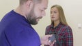 A man puts a woman on the sensors lie detector test