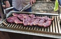 Man putting the best Entrecote Beef Steak On the bbq Royalty Free Stock Photo