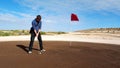 Man Putting at Coober Pedy Golf Course Royalty Free Stock Photo