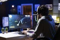 Man putting headphones on to play spaceship flying singleplayer game