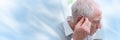 Man putting hearing aids; panoramic banner Royalty Free Stock Photo