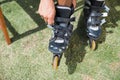 Man putting on his roller blades Royalty Free Stock Photo