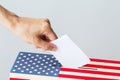 Man putting his vote into ballot box on election Royalty Free Stock Photo