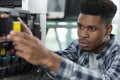 man putting new printer cartridge into printer Royalty Free Stock Photo