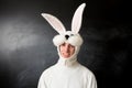 Man in a rabbit costume smiling