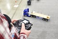 Man with radio remote control and truck model Royalty Free Stock Photo