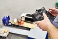 Man with radio remote control and truck model Royalty Free Stock Photo