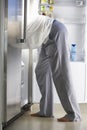 Man Raiding The Fridge At Night Royalty Free Stock Photo