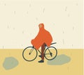 Man in rain coat is sitting on the saddle of a bicycle. Rainy wet weather in autumn, fall seasonal downpours and showers. Royalty Free Stock Photo