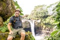 A man at The Rainbow Falls, Hilo, Wailuku River State Park, Big Island, Hawaii Royalty Free Stock Photo