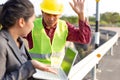 A man raise hands up for give up..Foreman afraid manager at site construction