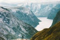 Man raised hands traveling at Naeroyfjord mountains Royalty Free Stock Photo