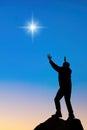 Man raised his hands and praises god, Christmas worship background Royalty Free Stock Photo