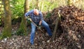Man raking leaves Royalty Free Stock Photo