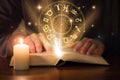 Man reading astrology book Royalty Free Stock Photo