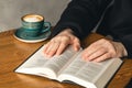 Man reading Bible early in the morning, Bible study, christianity. Royalty Free Stock Photo