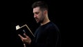 Man reading bible, spiritual support, religious belief, peace in soul, worship