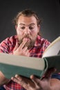 Man reading book with focus Royalty Free Stock Photo