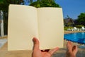 Man is reading a book on vacation Royalty Free Stock Photo