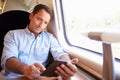 Man Reading E Book On Train Royalty Free Stock Photo