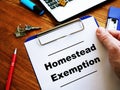 Man is reading Homestead Exemption at the home