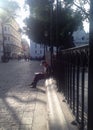 A man reading outdoors