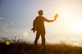 Man reading in the park against sunset Royalty Free Stock Photo