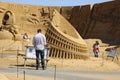 Man reading sign at sand sculpture festival Royalty Free Stock Photo