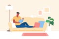 Man reading on sofa at home Royalty Free Stock Photo