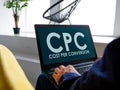 Man reads about Cost Per Conversion CPC on the internet.