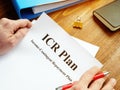 Man reads ICR Income-Contingent Repayment Plan Royalty Free Stock Photo